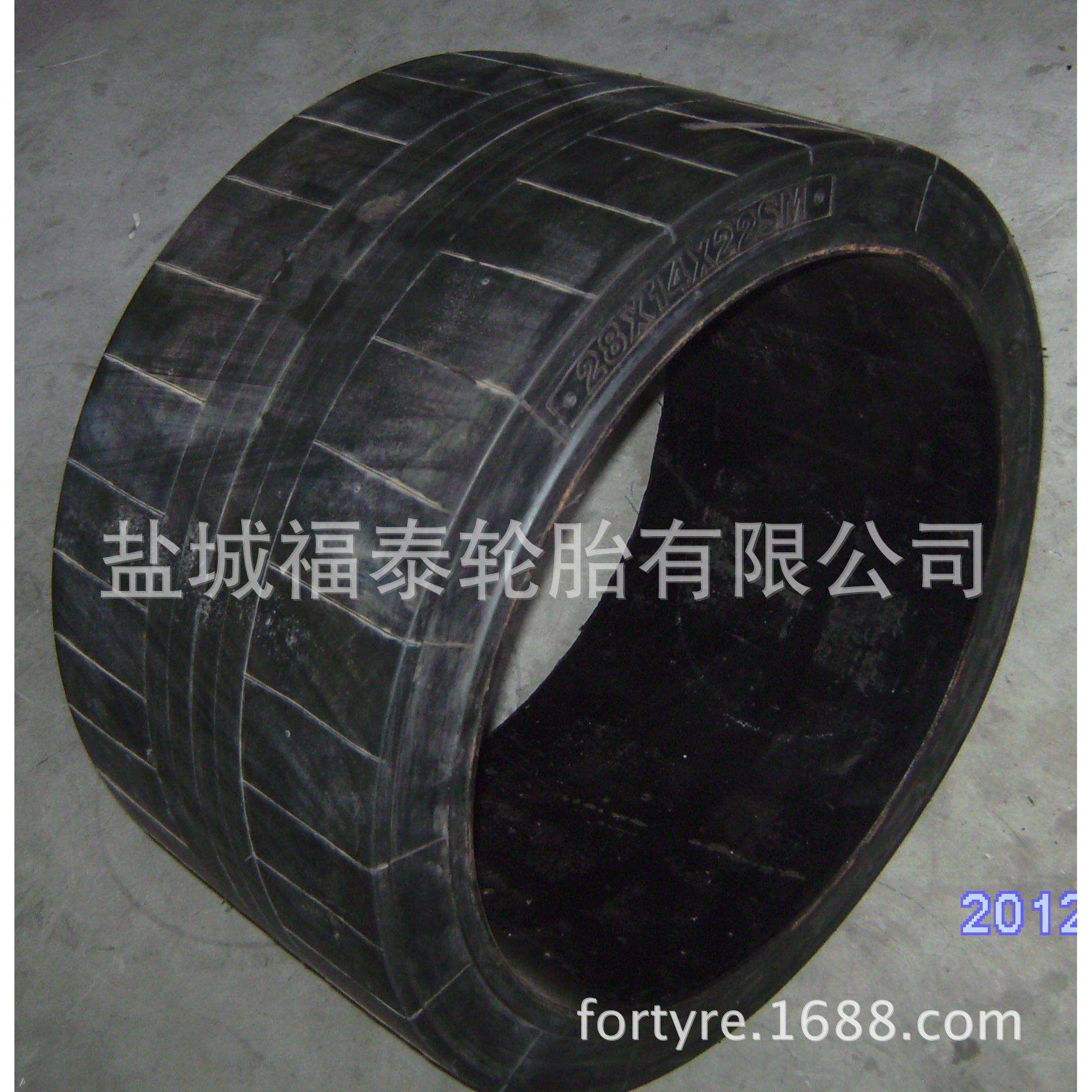 供应大负荷平板拖车42*14*32压配式粘结式实心轮胎/配铁心轮