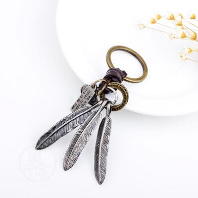 。Qinuo alloy leaf key chain personalized woven leather allo