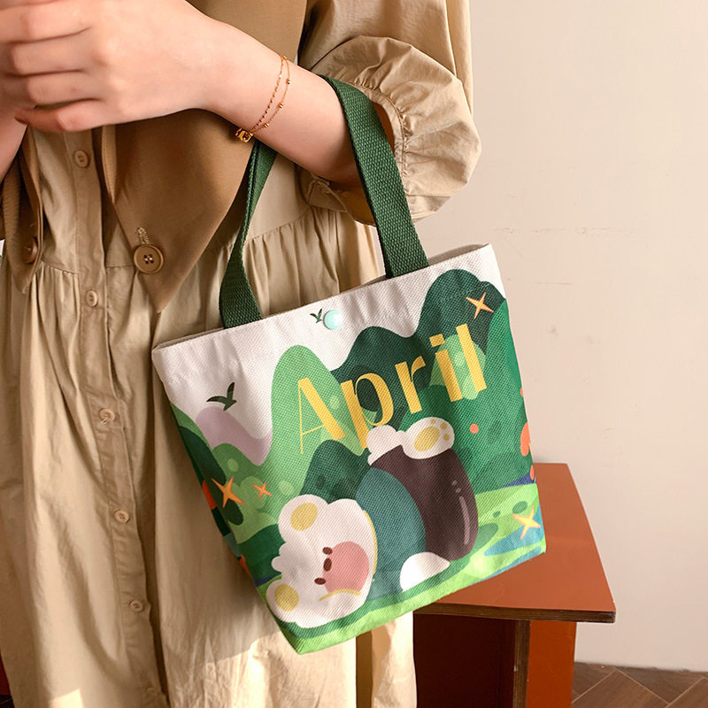 韩国手提卡通可爱帆布包女新款大容量学生上班饭盒包帆布包斜挎