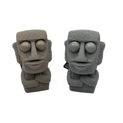 Stone man releases stress toy slowly rebounds soft Moai stat
