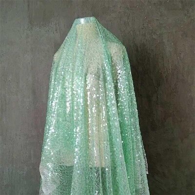 Fairy Light Green Wafer Shimmering Sequin Mesh Fabric