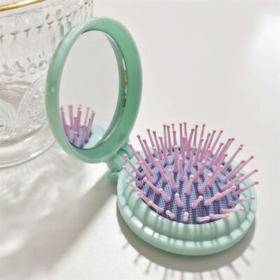 New girl powder compact portable air bag comb round hair