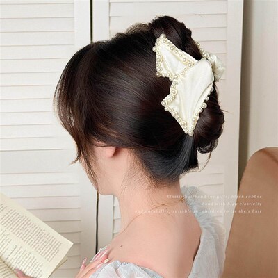 Zhu Zhu beaded triangular hair clip for women, exuding a hig