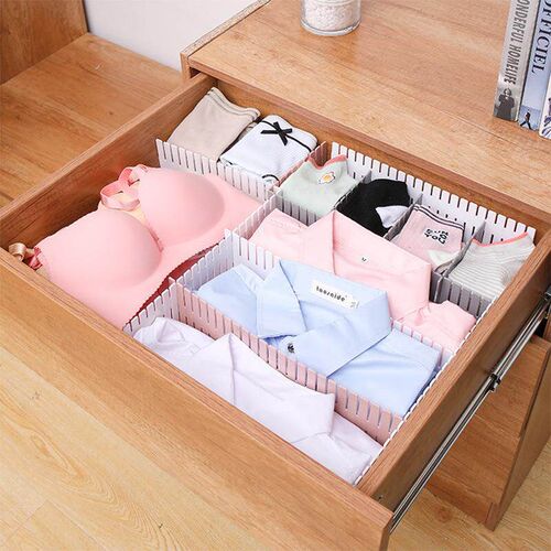 Drawer organizer with adjustable dividers and compartments.
