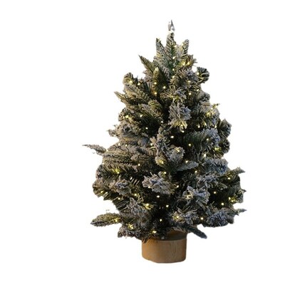 Snow-covered Christmas tree, desktop Christmas decoration