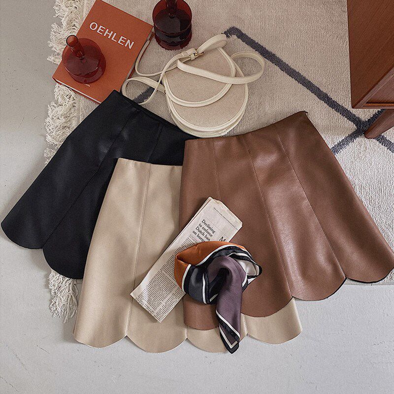 咖色小皮裙a字裙半身裙女2025秋冬大码胖mm高腰显瘦pu包臀短裙子