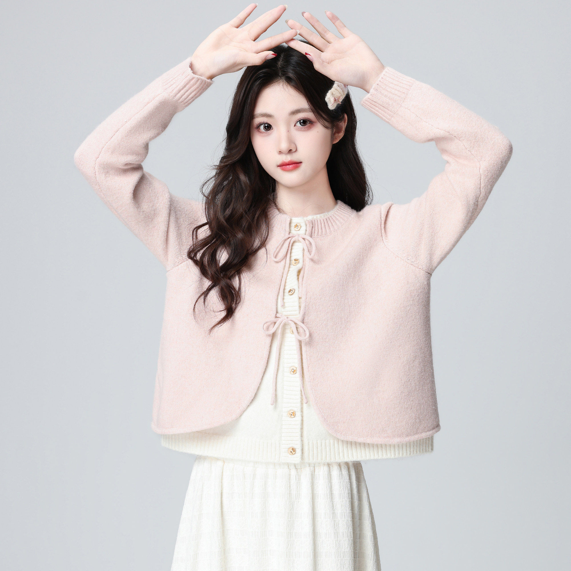 粉色假两件毛衣女秋冬2026冬新款撞色拼接蝴蝶结系带针织开衫上衣