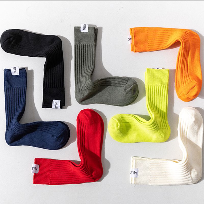 秋冬男女纯色棉中长筒潮袜子