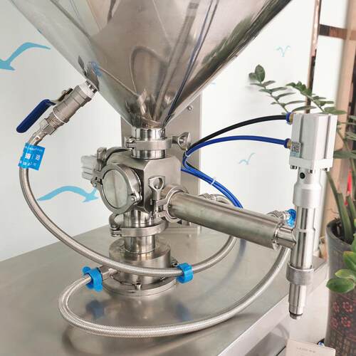 远杨气动磨砂膏加热灌装机半流体蜂蜜米糊半自动灌装机械设备