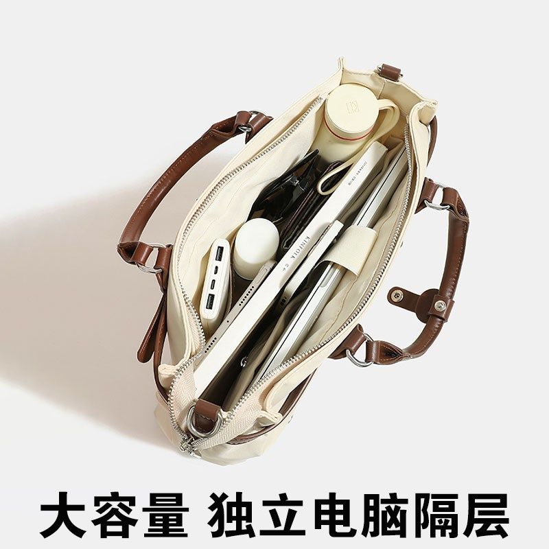 2025新款高级感女士手提公文包通勤单双肩背14寸电脑文件多分隔层