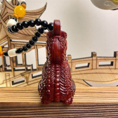 紫檀瑞兽麒麟手把件木雕文玩把玩件雕刻木质工艺品礼品7公分
