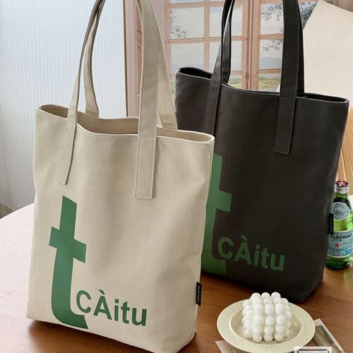 原创设计文艺字母时尚通勤加厚帆布托特学生休闲百搭单肩手提包袋