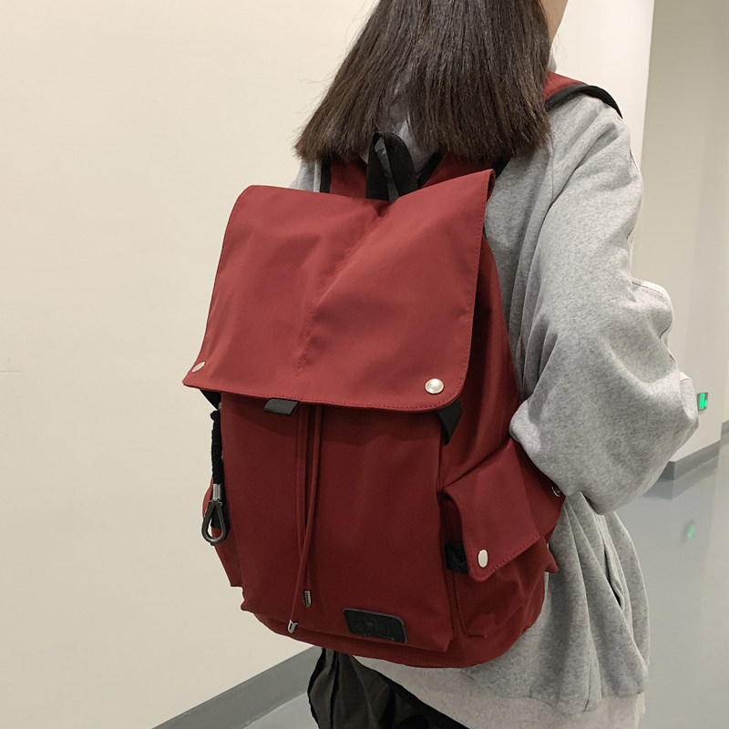 简约抽带大学生双肩包情侣背包韩版原宿ulzzang高中生休闲书包男