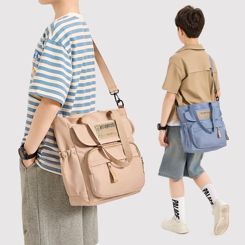 小学生斜挎包男孩补课班儿童青少年帆布包初中学生手提拎书补习袋