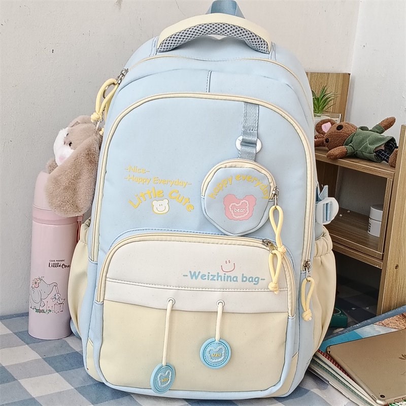 书包女生减负护脊超轻便小学生三到六年级简约大容量初中生双肩包