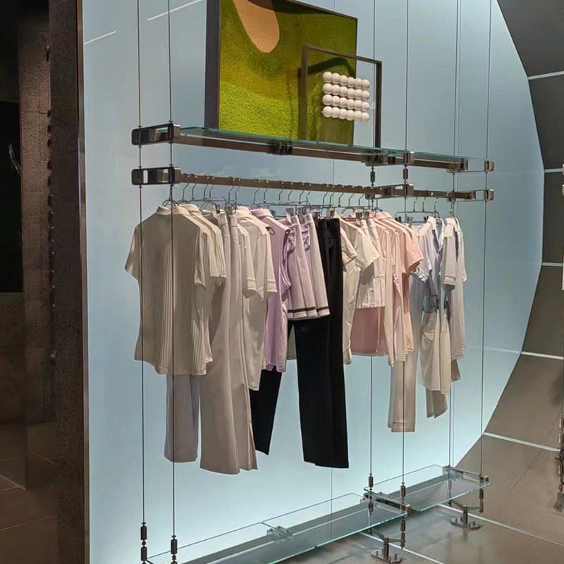 服装店展示架不锈钢上墙壁挂式陈列架网红玻璃纤维丝吊挂女装店货