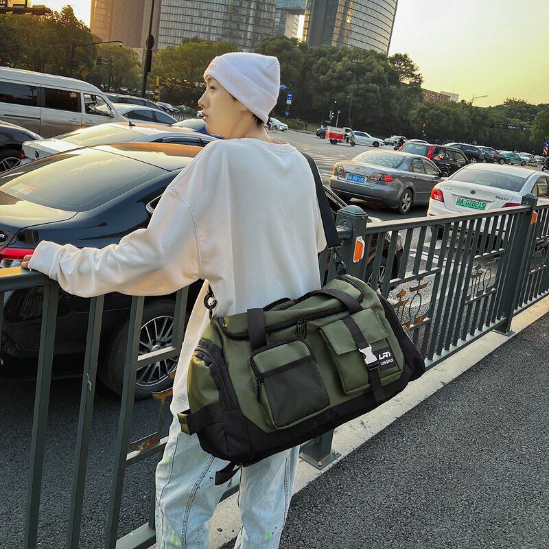 大容量运动双肩包工装机能多功能斜挎包青年旅行背包防泼水手提包