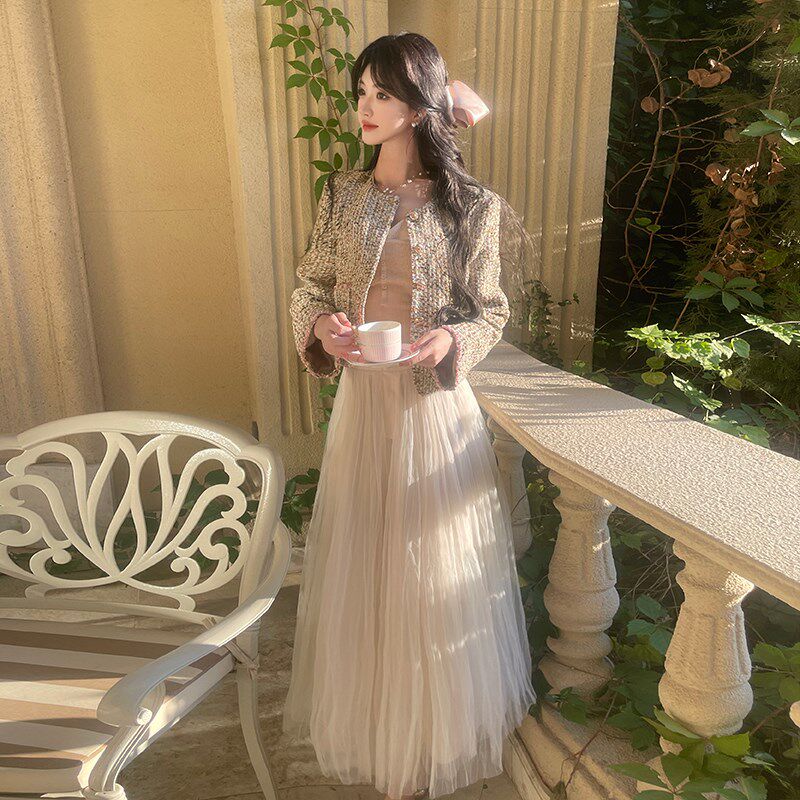 许愿池少女_纽扣腰头轻奢高级感白色纱裙半身裙春秋季2025新款