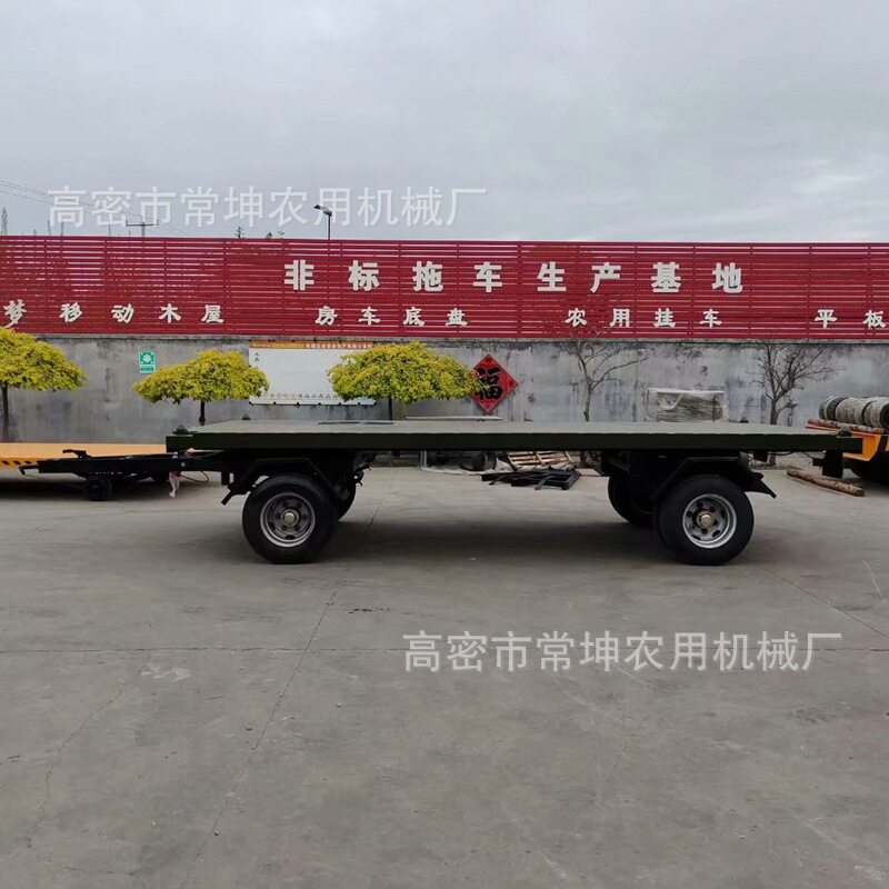 工厂定制双向牵引车载重10吨场地运转工具车大吨位充气胎平板拖车