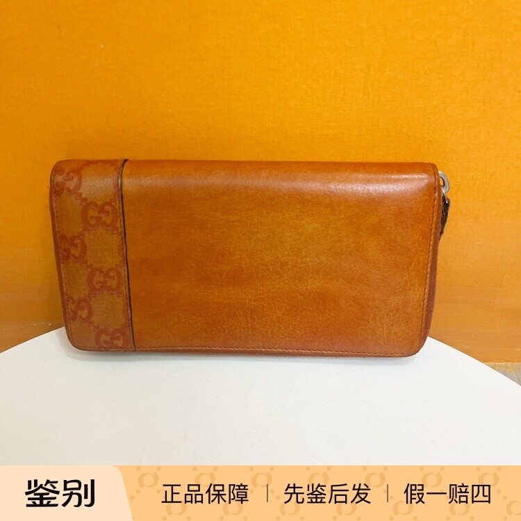 古驰棕色压花拉链长款手拿钱包