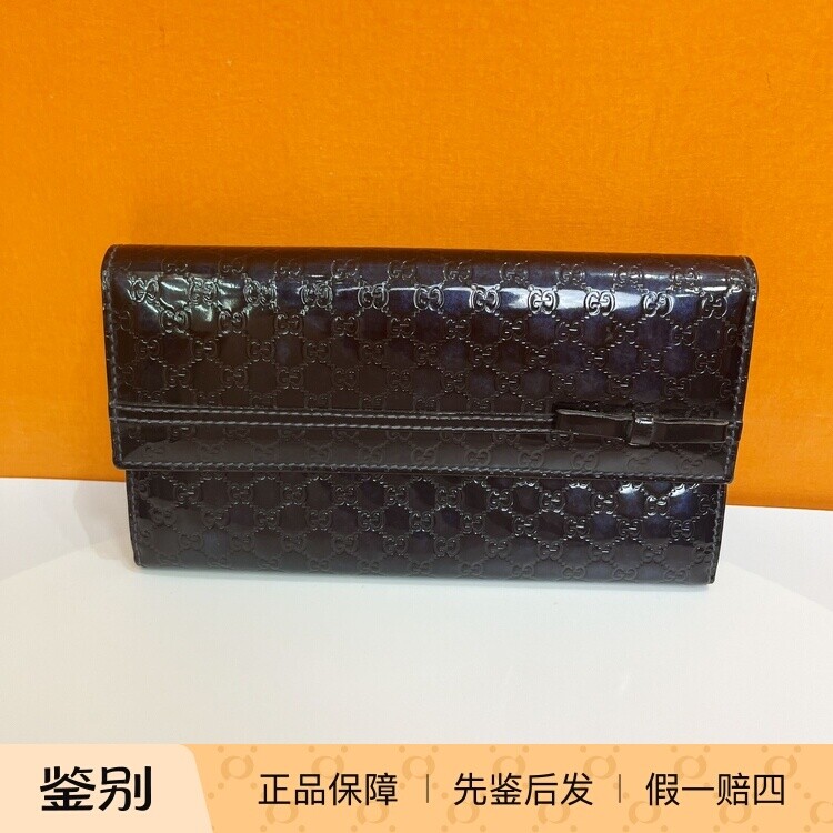古驰黑色满印压花长款女士钱包