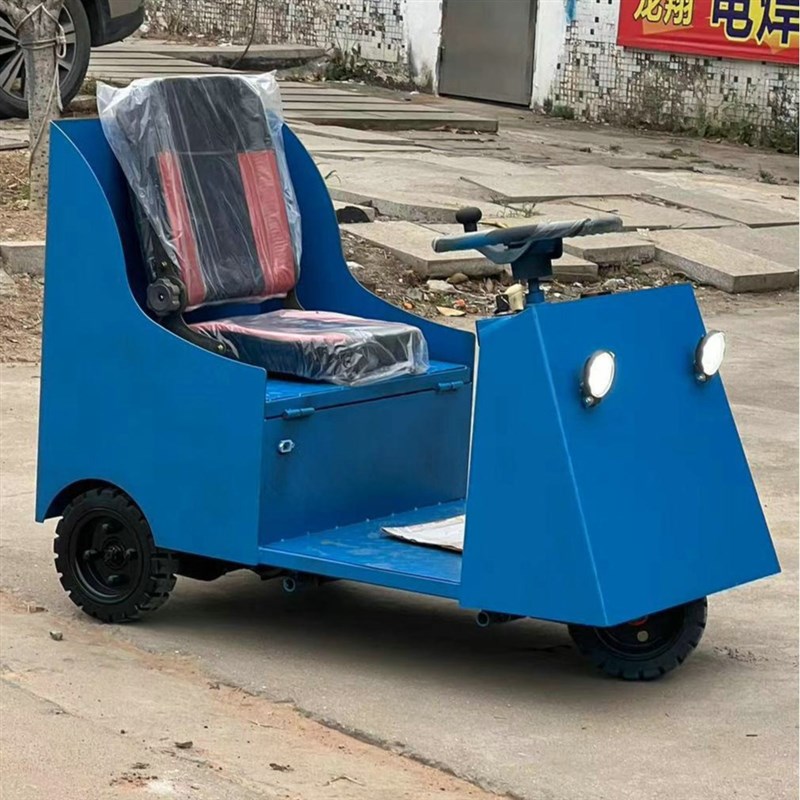新款电动牵引车微型o牵引车电动拖车小型搬运车拉货车方向盘坐驾