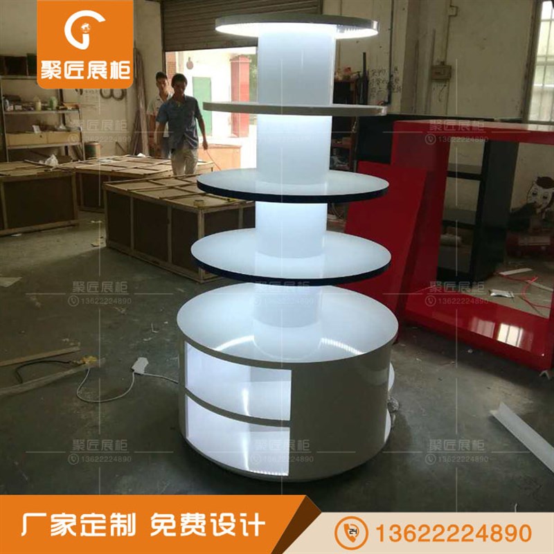 整店儿童玩具展柜圆形通透高柜雕塑造H型雕花展示台玻璃钢树叉柜