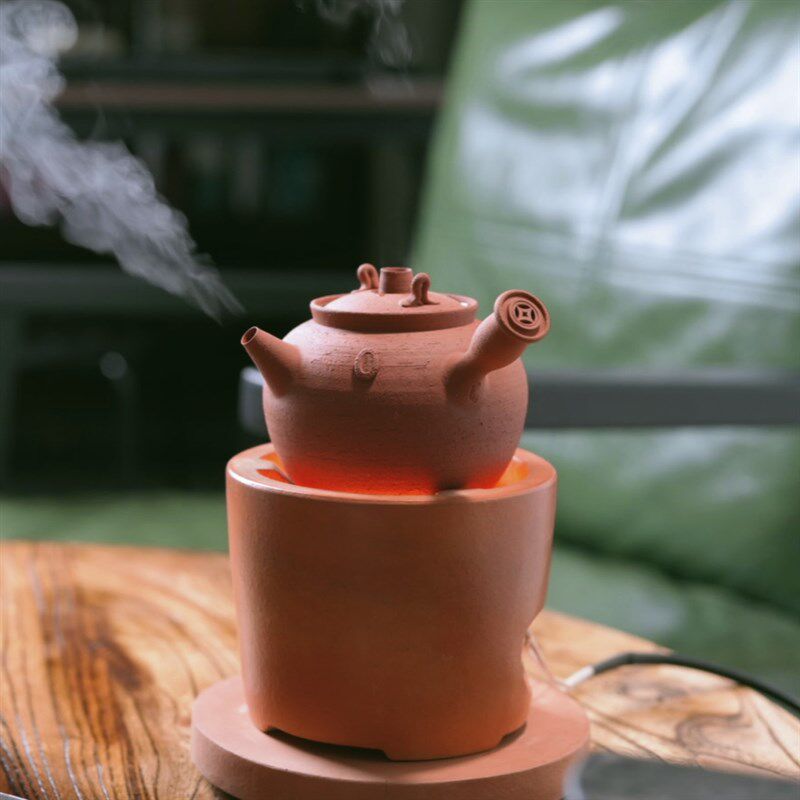 苏铭智穿心铫红罐潮州砂铫玉书煨古铜钱把手款潮州手拉壶