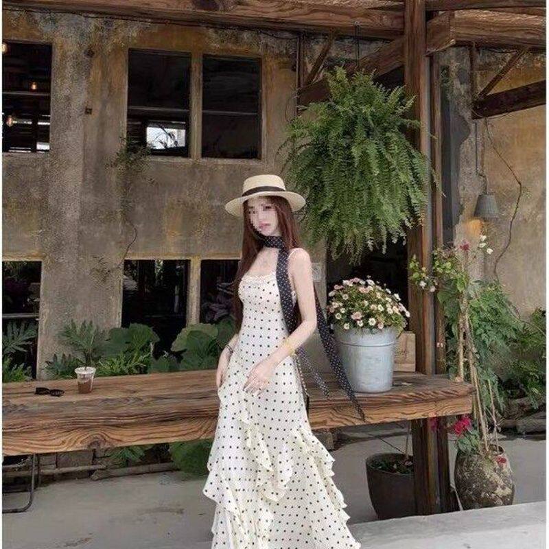 白色波点花边吊带裙连衣裙女巨好看早春漂亮收腰显瘦包臀裙子