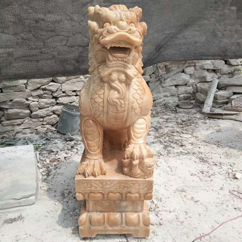 石雕麒麟晚霞红麒麟一对酒店门口摆件狮子大象动物摆件厂家制作