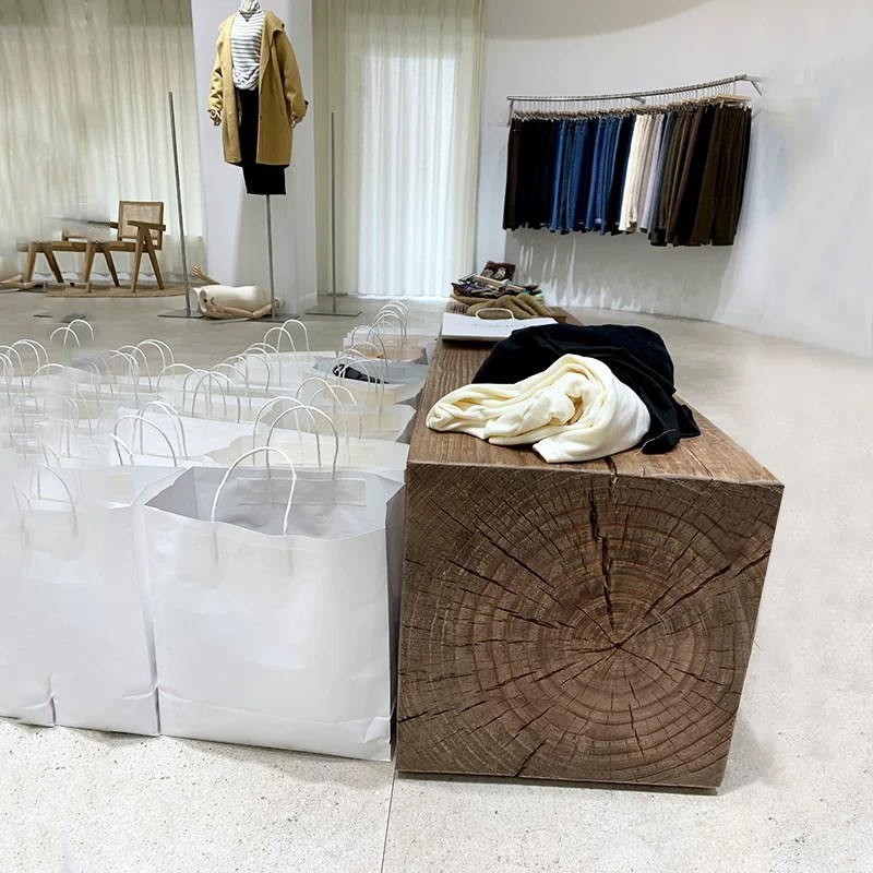 服装店展示桌摆台架子实木创意中岛流水台女装店货架装饰展示地台