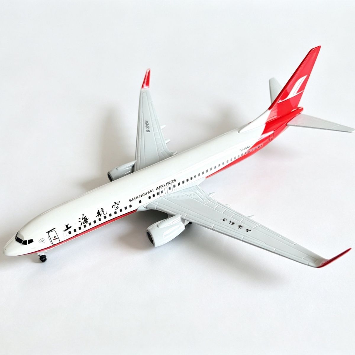 上海航空737飞机模型带轮子带起落架合金仿真便宜的飞机模型摆件
