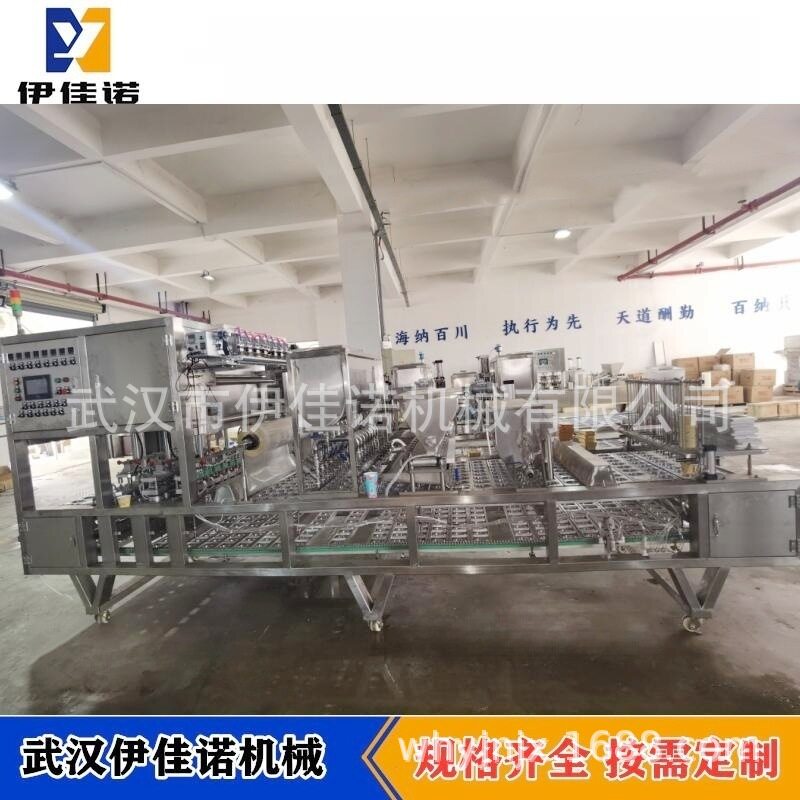伊佳诺机械一出六杯装水果罐头自动灌装封口机包装机流水线