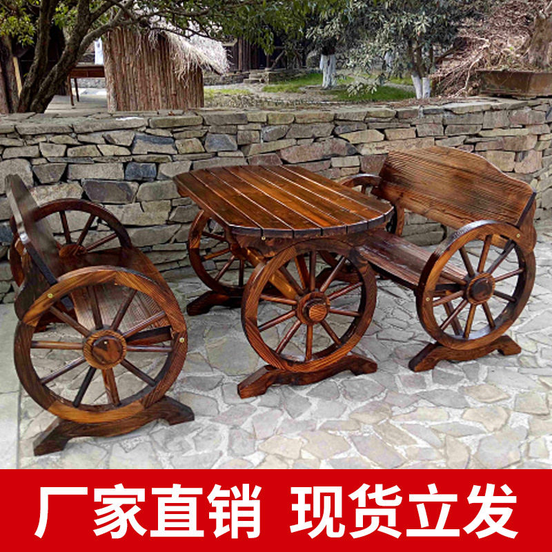 r^户外防腐木车轮桌椅组合酒吧餐厅阳台室外庭院实木碳化桌椅三件图片