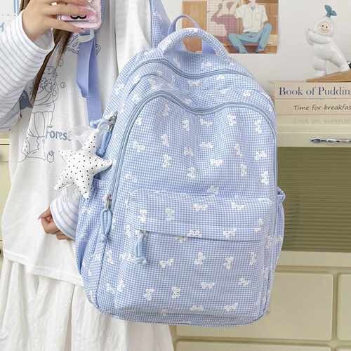 日系原宿风可爱蝴蝶结大容量高颜值小学生书包女初中生双肩背包