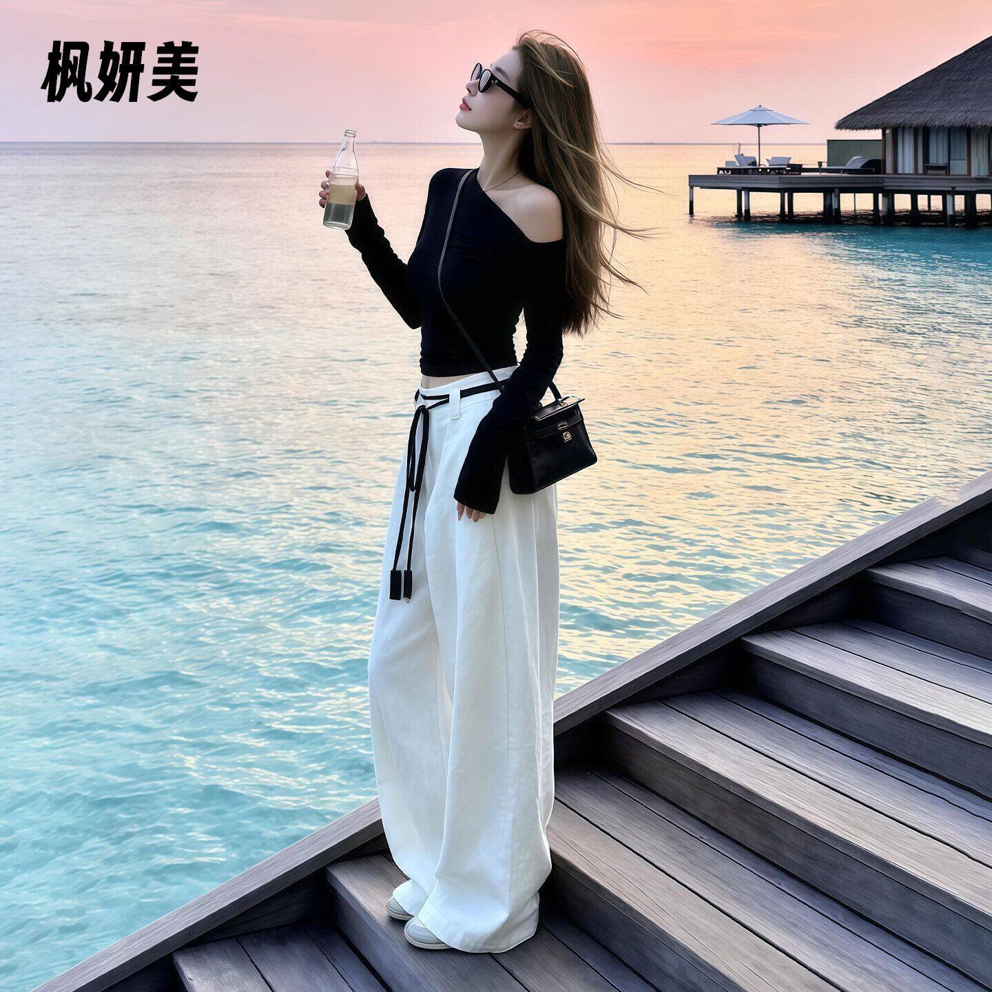 早秋韩系巨好看穿搭一整套2026新款黑色长袖斜肩上衣女阔腿裤套装