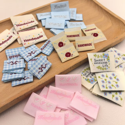 现货大肠卷对折标小标签订做布标织标手工handmade制作辅料夹标