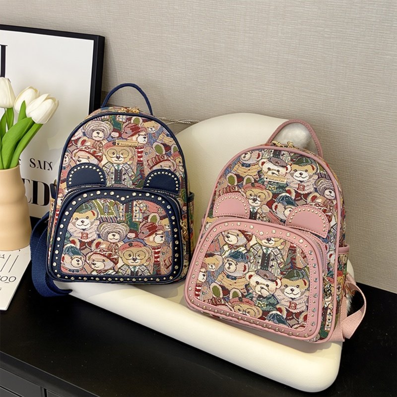 2025新款双肩包女包百搭卡通小熊休闲帆布书包大容量撞色通勤背包