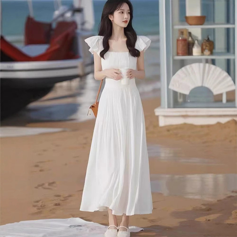 法式白色小飞袖连衣裙春夏高端精致女神范气质感海边度假温柔