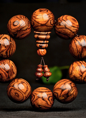 星玺海南黄花梨手串鬼眼鬼脸对眼