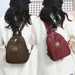 牛津布双肩包女2025新款时尚轻便小型高级感胸包旅游帆布背包休闲