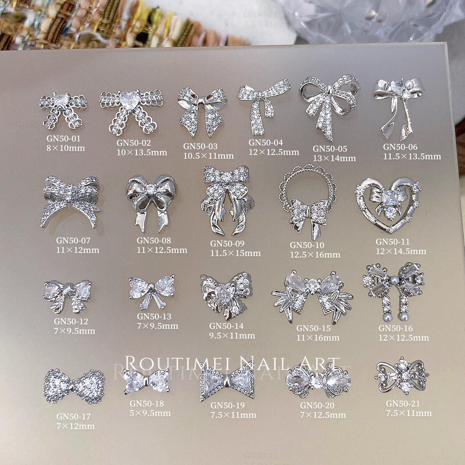新款美甲蝴蝶结锆石高级爆款百搭指甲饰品镂空飘带蝴蝶结爱心钻饰