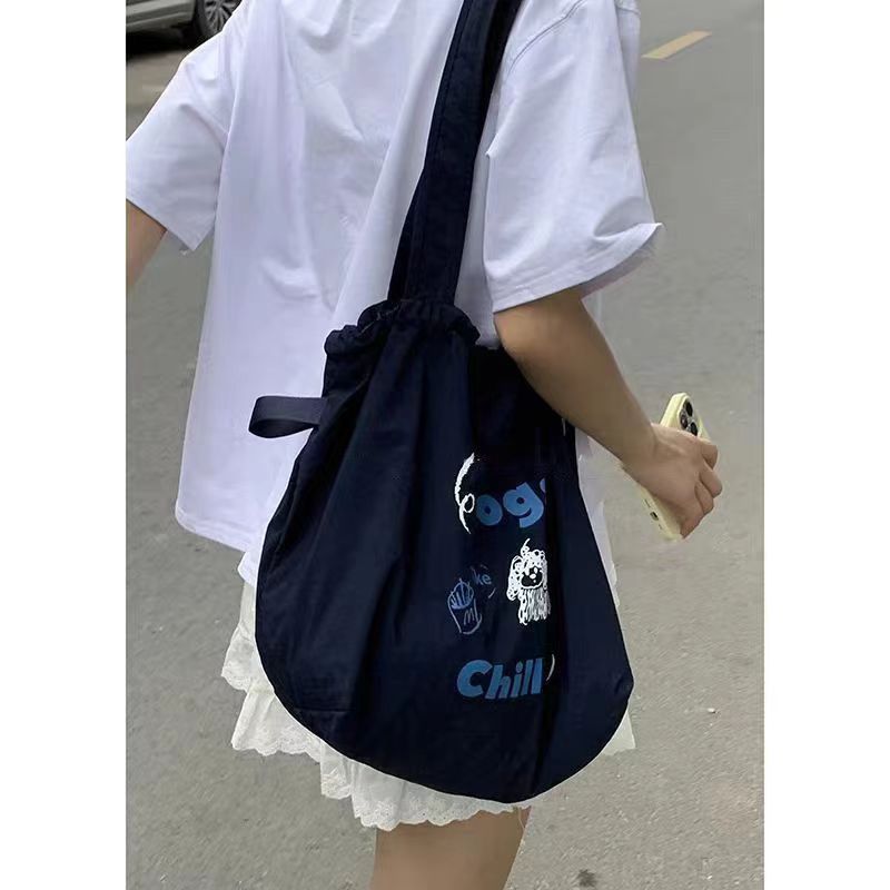 日系简约街拍帆布托特包包 慵懒风抽绳帆布袋韩版学生上课书包袋