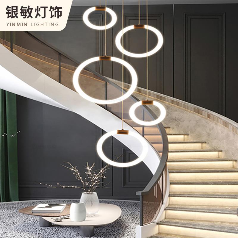 楼梯客厅复式长吊灯公寓别墅酒店现代简约拉环圆形北欧灯饰全屋