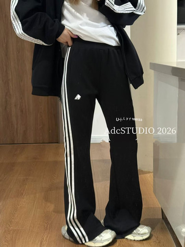 十三行2026春季新款韩版刺绣条纹拼接松紧腰微喇叭休闲运动长裤女