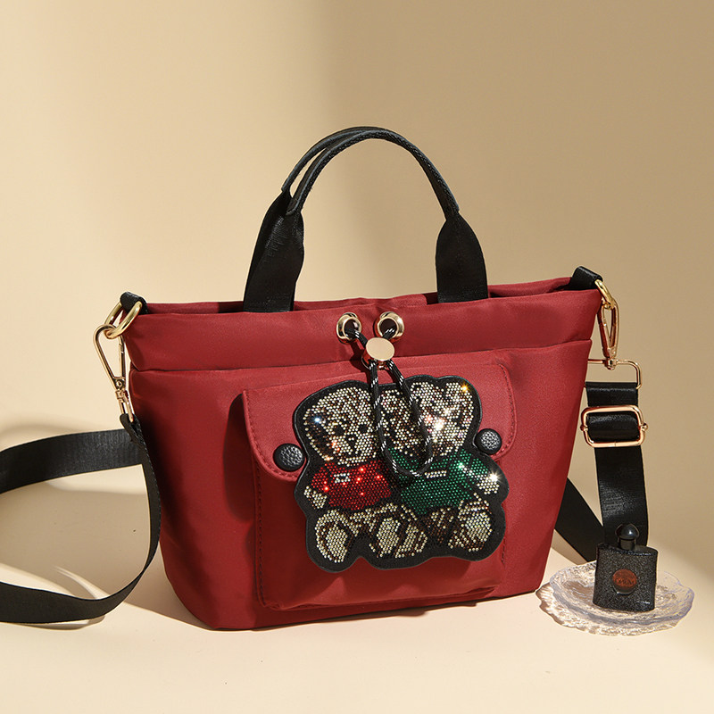 百搭时尚包包女2026新款高级牛津布轻便小包女士帆布包休闲斜挎包