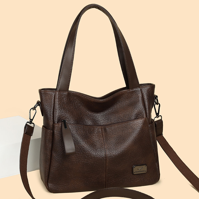 真皮包包女2025新款水桶包大容量包包通勤包时尚宽肩带单肩斜挎包