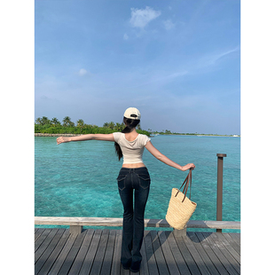 深蓝色水洗磨白弹力牛仔微喇长裤 GYOKUU 2025ss