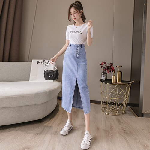 Women's fall 2019 dress with high waist and hip length skirt showing thin denim skirt