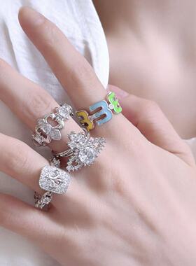 精致轻奢微镶锆石鸢尾花土星戒指女小众设计高级感开口可调节指环